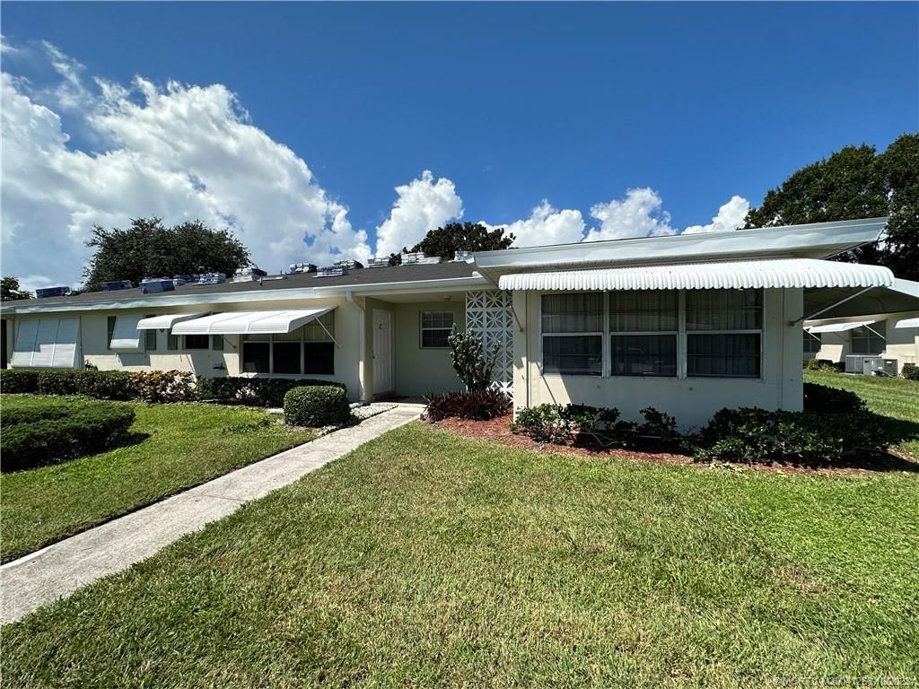 Photo of 115 Lakes End Drive #C, Fort Pierce, FL 34982 (MLS # M20041266)