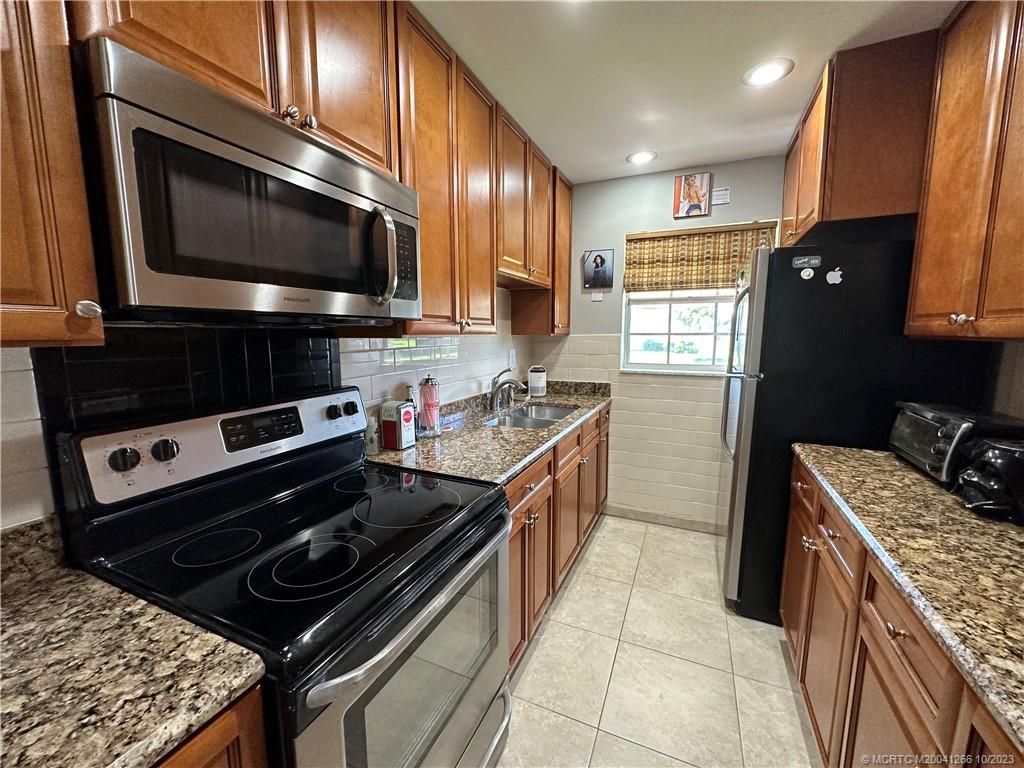 Photo of 115 Lakes End Drive #C, Fort Pierce, FL 34982 (MLS # M20041266)