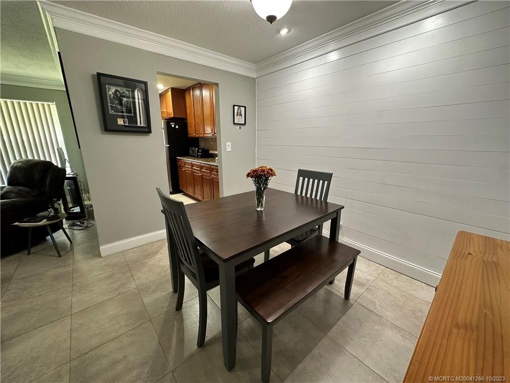 Photo of 115 Lakes End Drive #C, Fort Pierce, FL 34982 (MLS # M20041266)