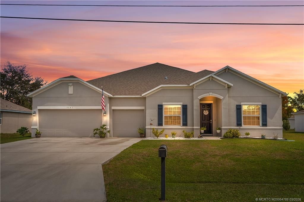 Photo of 3141 SW Letchworth Street, Port Saint Lucie, FL 34953 (MLS # M20054788)