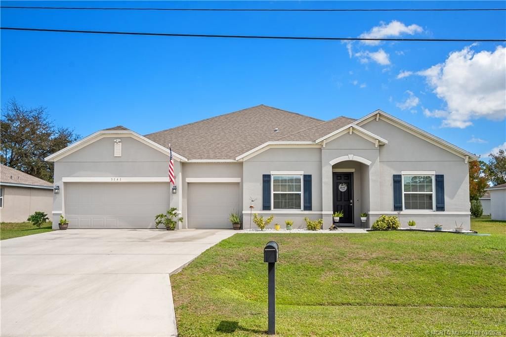 Photo of 3141 SW Letchworth Street, Port Saint Lucie, FL 34953 (MLS # M20054788)