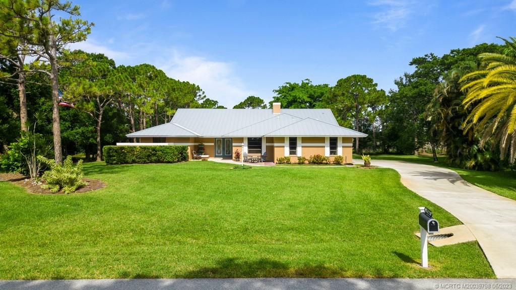 Photo of 2746 NE Cypress Lane, Jensen Beach, FL 34957 (MLS # M20039798)