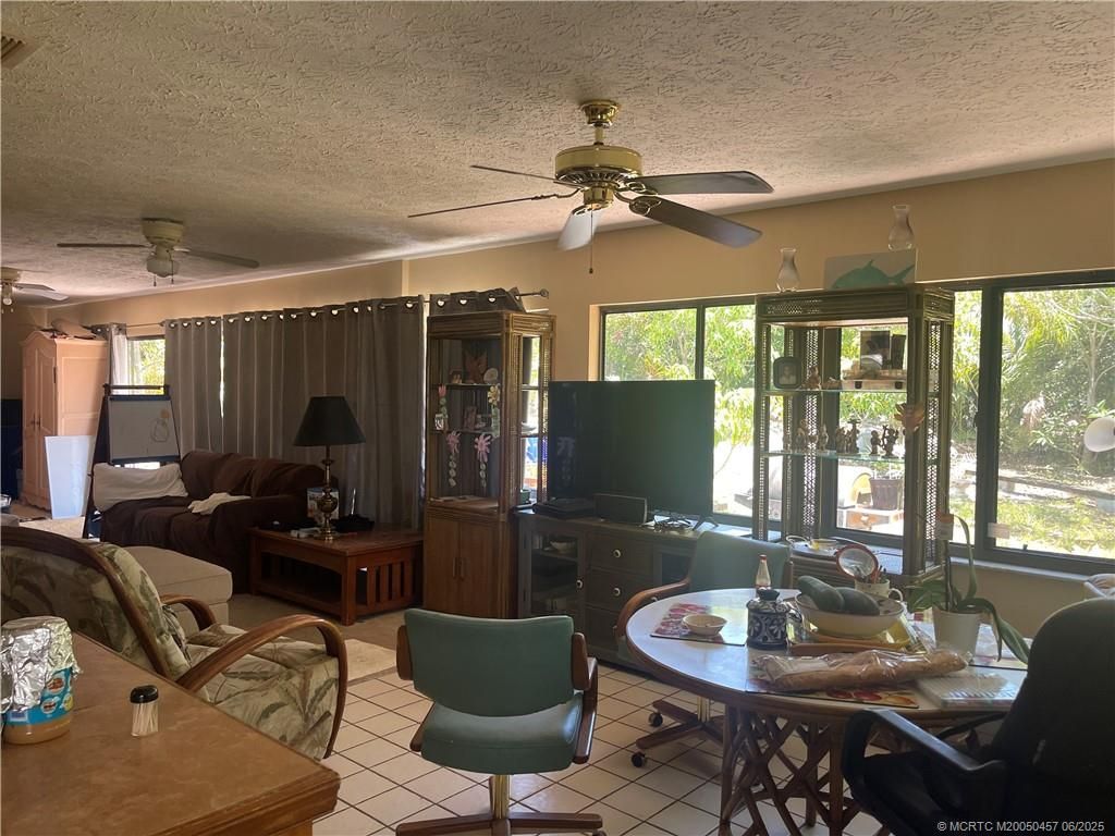 Photo of 1128 NE Quinn Place, Jensen Beach, FL 34957 (MLS # M20050457)