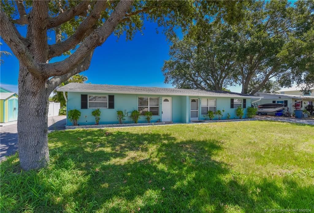 Photo of 113 SW Hideaway Place, Stuart, FL 34994 (MLS # M20043907)