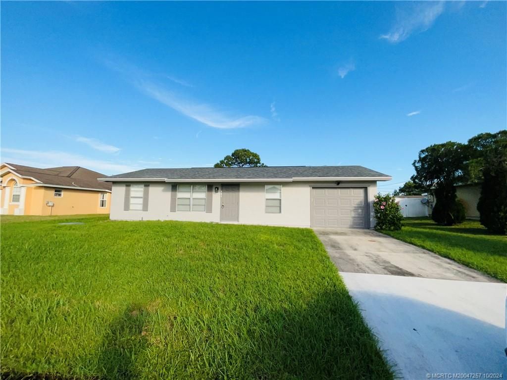 Photo of 941 SW Fenway Road, Port Saint Lucie, FL 34953 (MLS # M20047257)