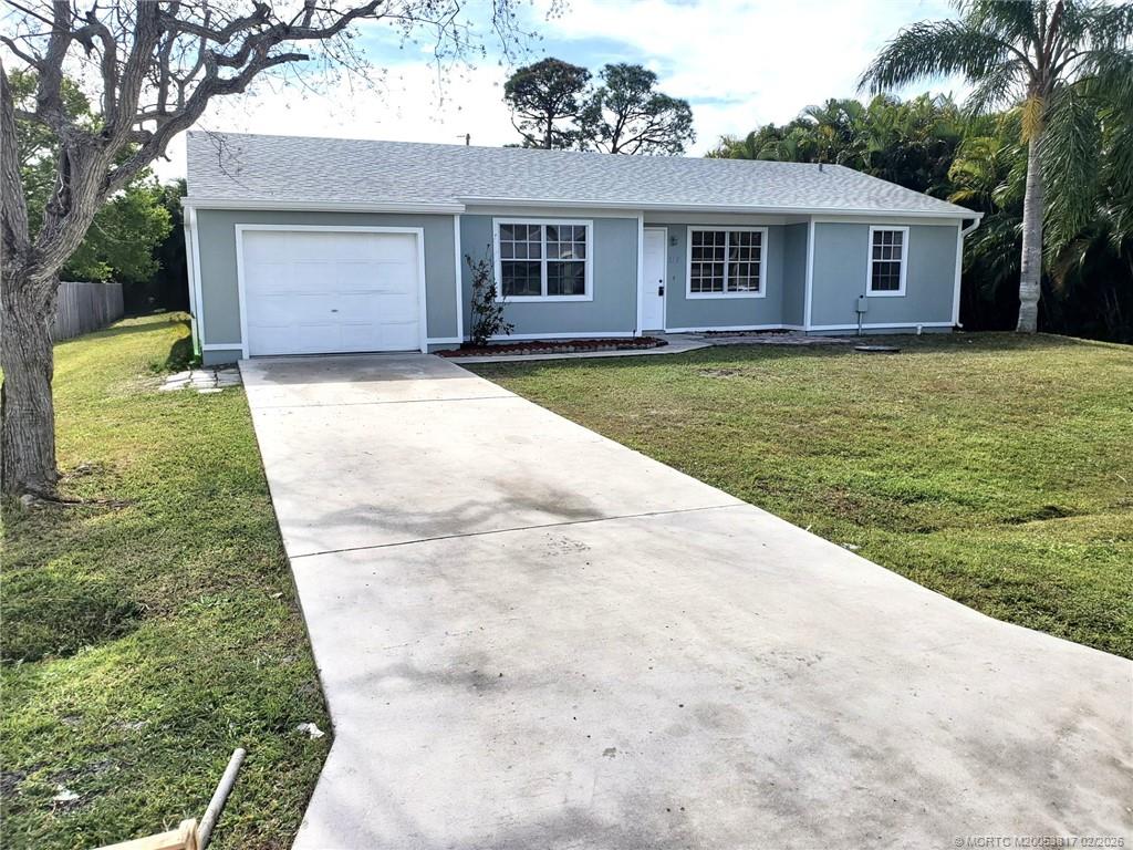 Photo of 2965 SE Buccaneer Circle, Port Saint Lucie, FL 34952 (MLS # M20053817)