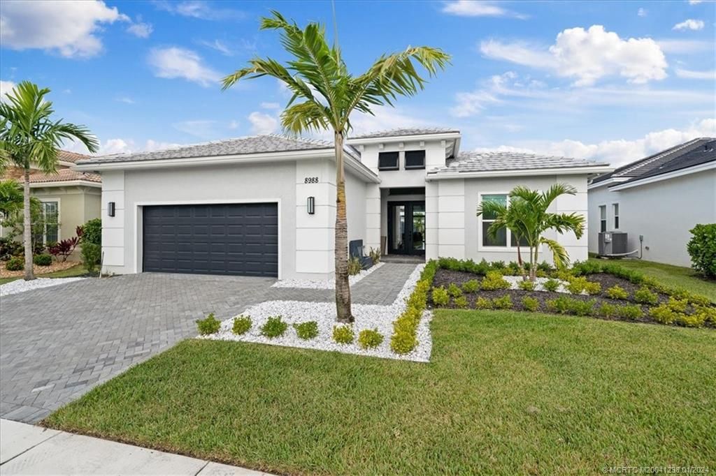 Photo of 8988 SW Matilda Way, Port Saint Lucie, FL 34987 (MLS # M20041238)