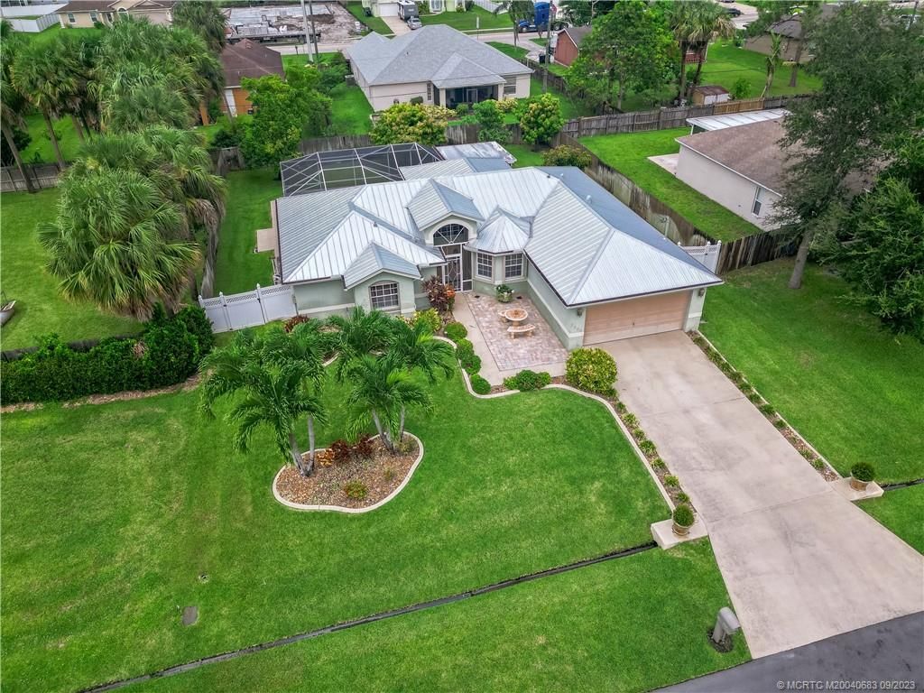 Photo of 2550 SW Dawn Street, Port Saint Lucie, FL 34953 (MLS # M20040683)