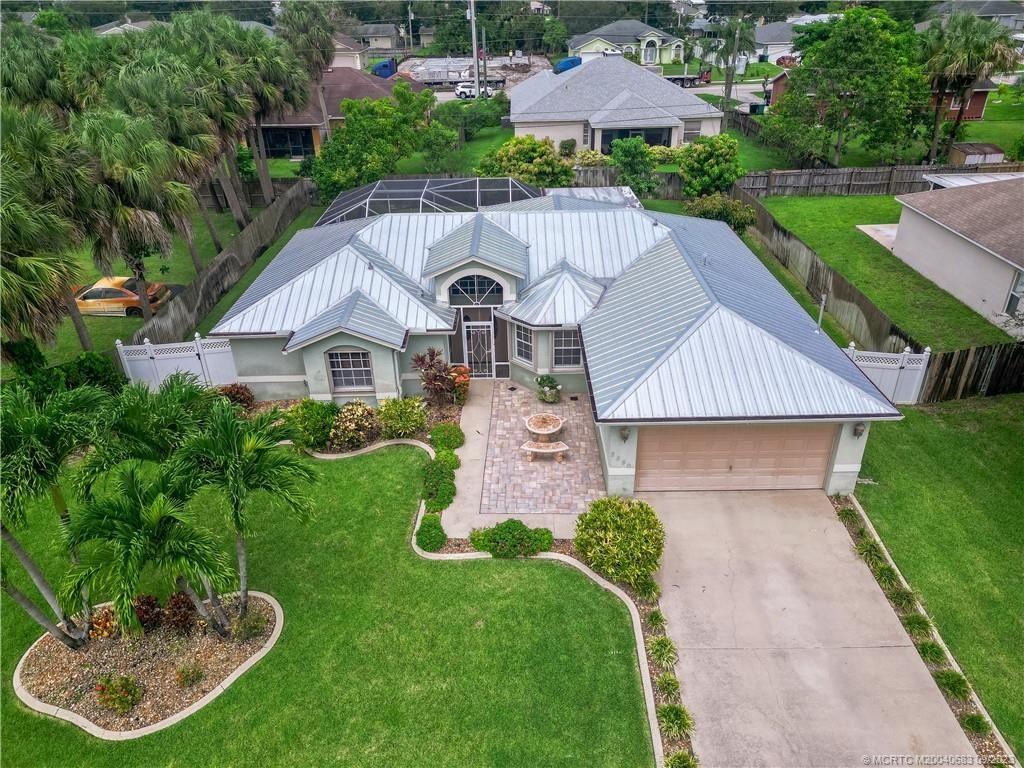 Photo of 2550 SW Dawn Street, Port Saint Lucie, FL 34953 (MLS # M20040683)