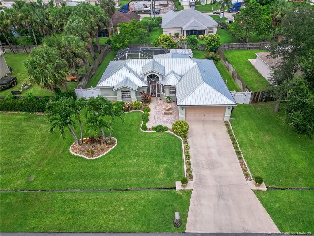 Photo of 2550 SW Dawn Street, Port Saint Lucie, FL 34953 (MLS # M20040683)