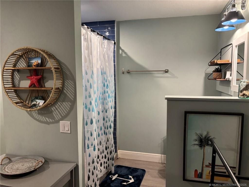 Photo of 1074 NE Orange Avenue, Jensen Beach, FL 34957 (MLS # M20050969)