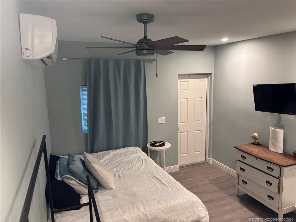 Photo of 1074 NE Orange Avenue, Jensen Beach, FL 34957 (MLS # M20050969)