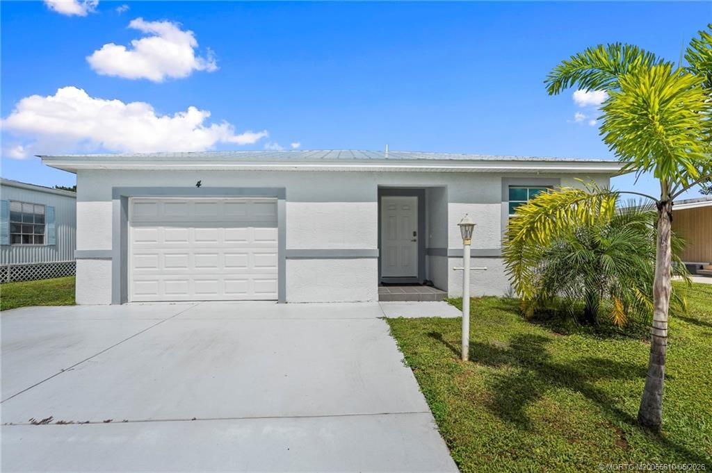 Photo of 4 La Paloma Lane, Port Saint Lucie, FL 34952 (MLS # M20055610)