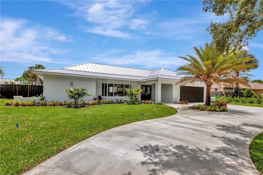Photo of 351 Country Club Drive, Tequesta, FL 33469 (MLS # M20052637)