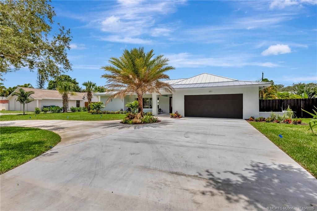 Photo of 351 Country Club Drive, Tequesta, FL 33469 (MLS # M20052637)