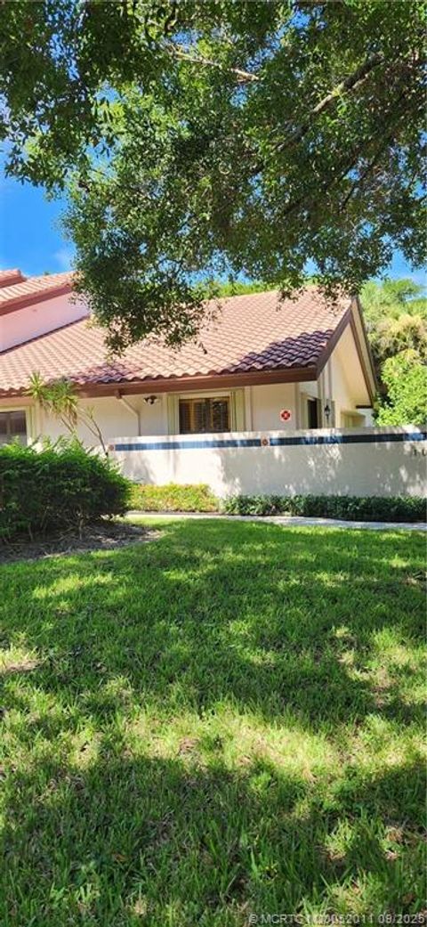 Photo of 6001 SE Martinique Drive #104, Stuart, FL 34997 (MLS # M20052011)