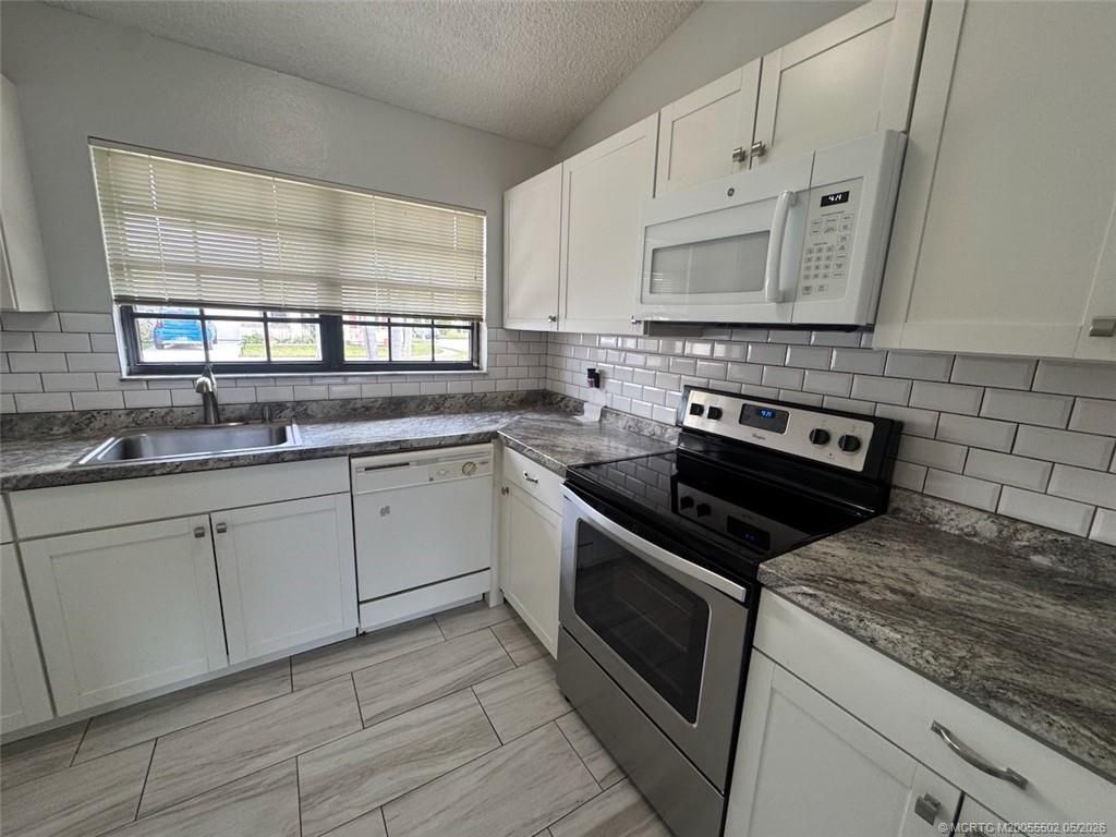Photo of 2398 SE Brekenridge Circle, Port Saint Lucie, FL 34952 (MLS # M20055502)