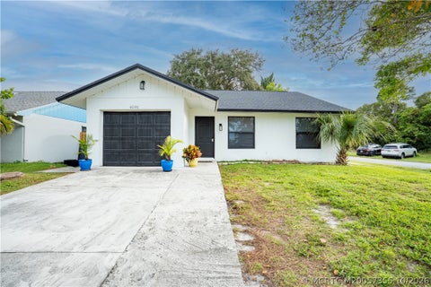 Photo of 5030 SE Dell Street, Stuart, FL 34997 (MLS # M20057355)