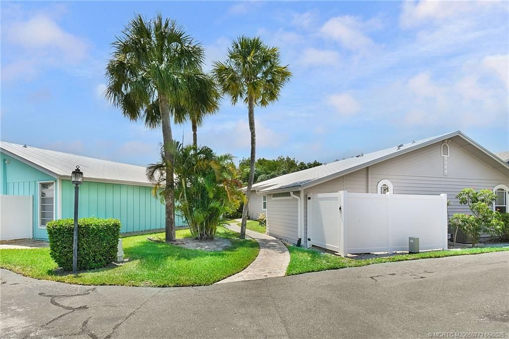 Photo of 4044 NE Breakwater Drive, Jensen Beach, FL 34957 (MLS # M20050773)