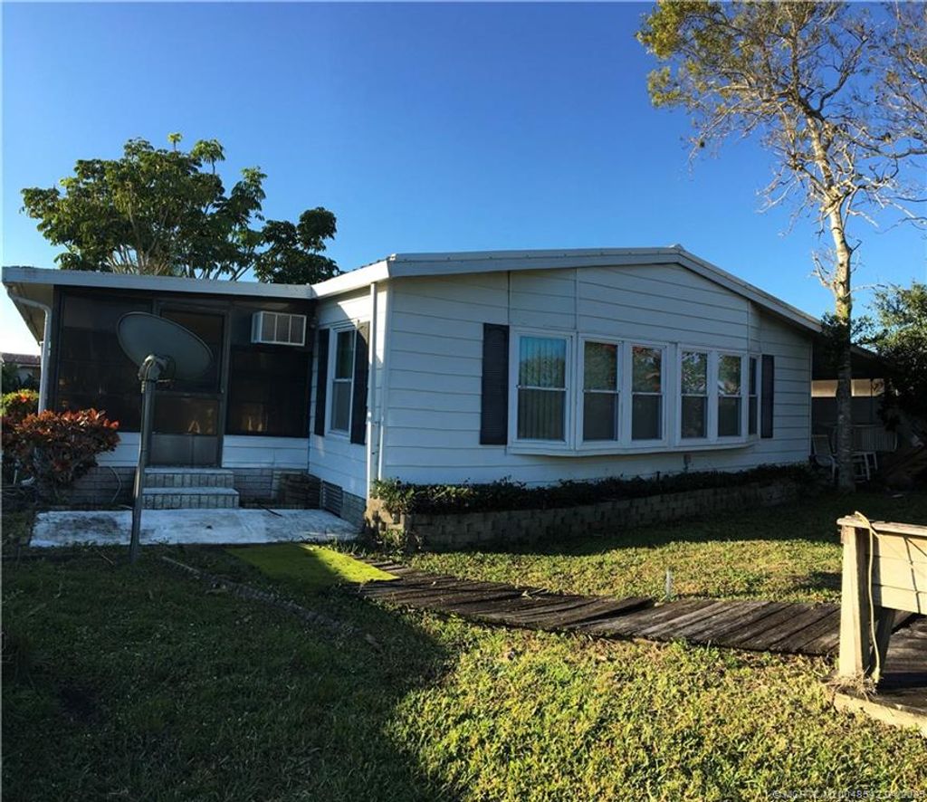 Photo of 14301 SW Divot Drive, Indiantown, FL 34956 (MLS # M20048542)