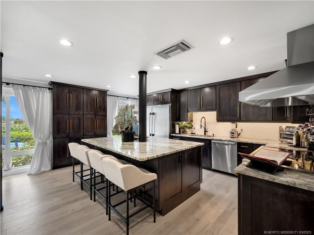 Photo of 245 NE Macarthur Boulevard #8, Stuart, FL 34996 (MLS # M20038171)