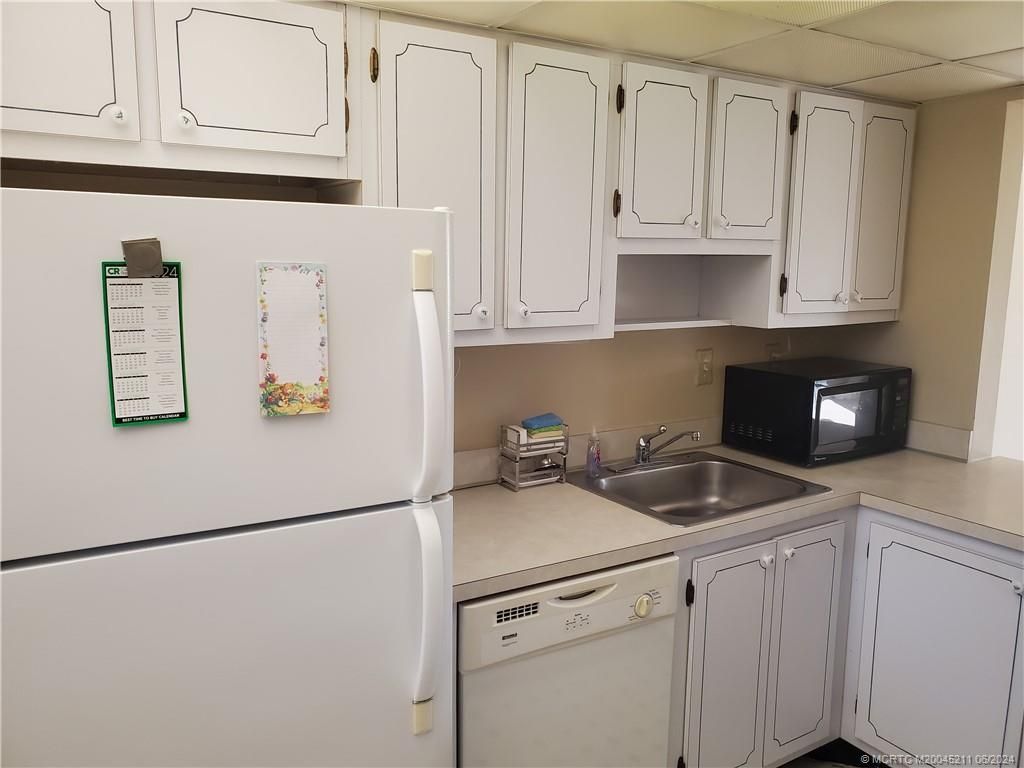 Photo of 5353 SE Miles Grant Road #F 102, Stuart, FL 34997 (MLS # M20045211)