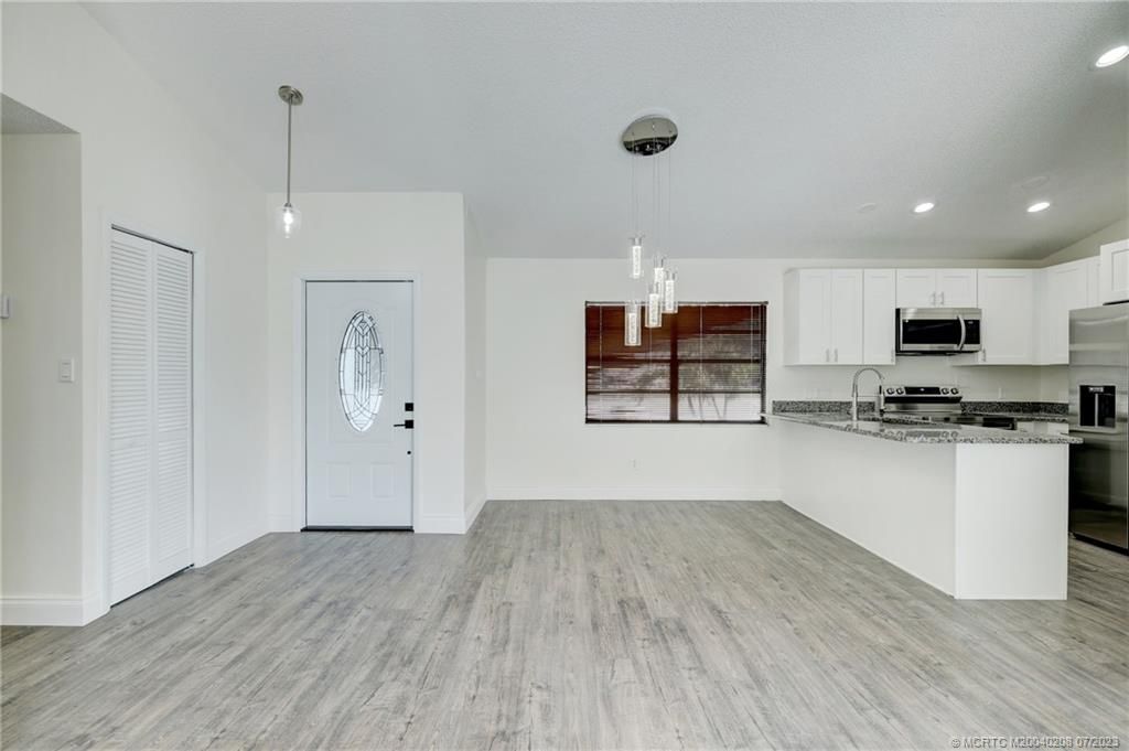 Photo of 354 E Prima Vista Boulevard, Port Saint Lucie, FL 34983 (MLS # M20040208)