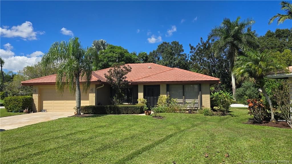 Photo of 2225 SW Creekside Drive, Palm City, FL 34990 (MLS # M20052688)
