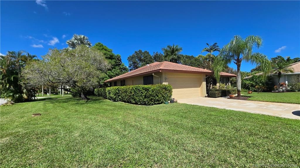 Photo of 2225 SW Creekside Drive, Palm City, FL 34990 (MLS # M20052688)