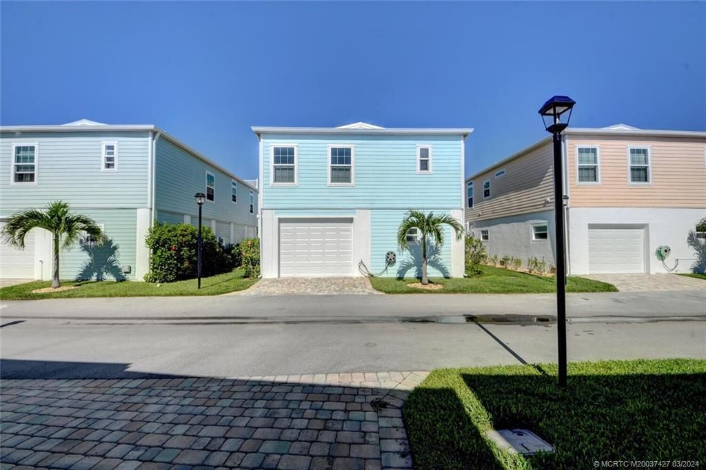 Photo of 421 NE Intercoastal Drive, Jensen Beach, FL 34957 (MLS # M20037427)