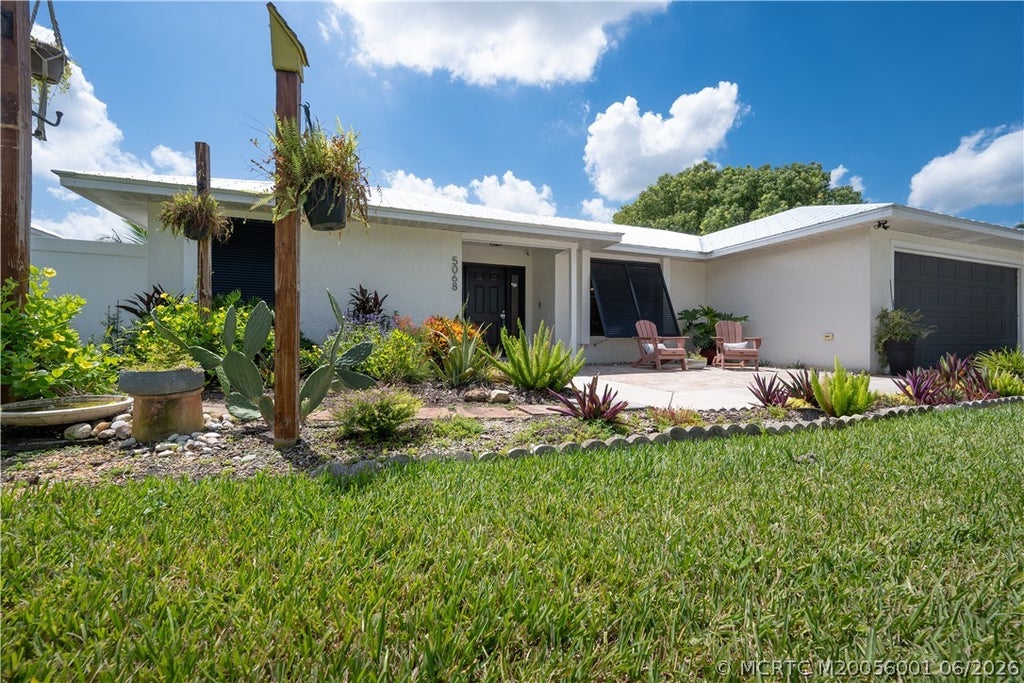 Photo of 5068 SE Major Way, Stuart, FL 34997 (MLS # M20056001)