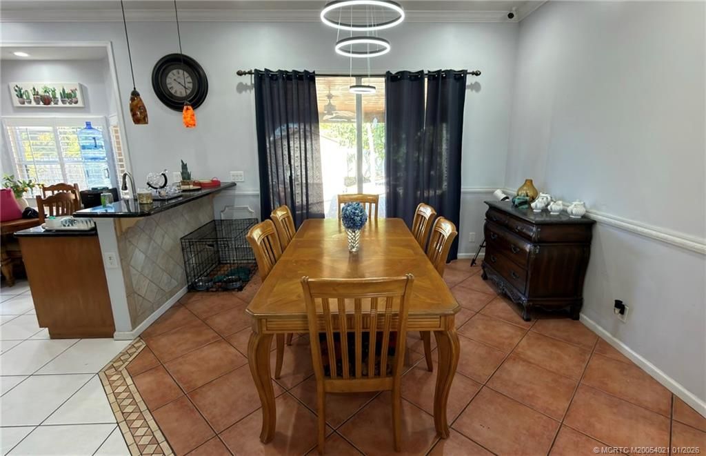 Photo of 631 SW Saragossa Avenue, Port Saint Lucie, FL 34953 (MLS # M20054021)