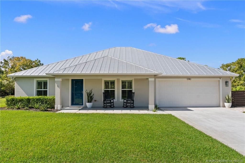 Photo of 5740 SE Ault Avenue, Stuart, FL 34997 (MLS # M20047100)