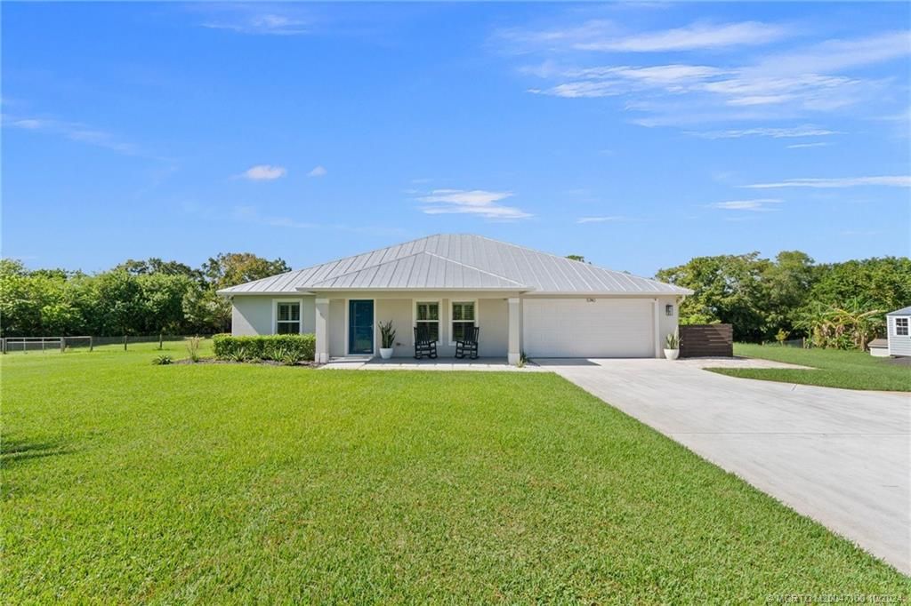 Photo of 5740 SE Ault Avenue, Stuart, FL 34997 (MLS # M20047100)