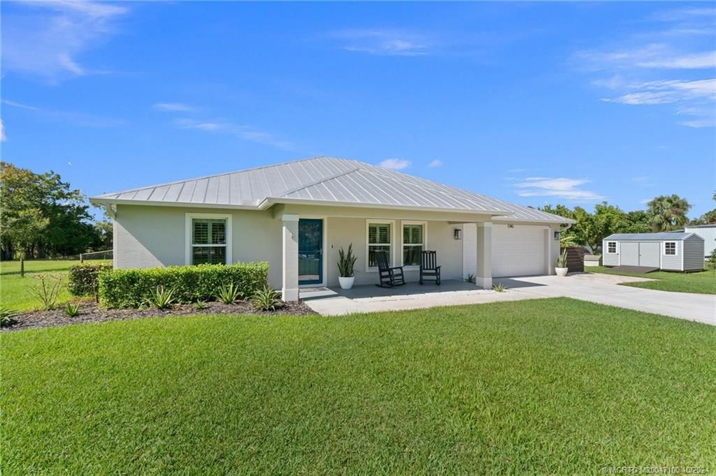 Photo of 5740 SE Ault Avenue, Stuart, FL 34997 (MLS # M20047100)