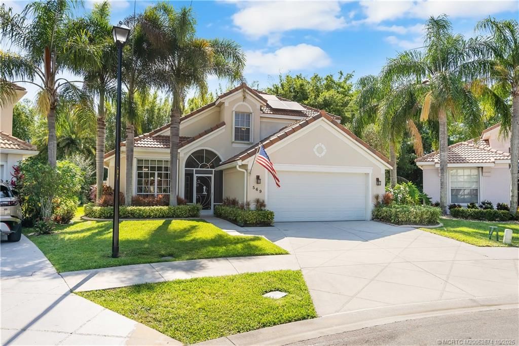 Photo of 569 SW Saint Martins Cove, Port Saint Lucie, FL 34986 (MLS # M20052674)