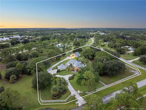 Photo of 10107 SW Abilene Lane, Palm City, FL 34990 (MLS # M20051584)