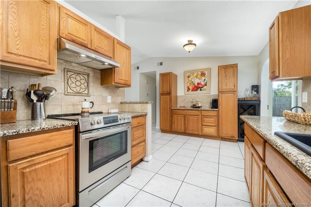 Photo of 656 SE Ron Rico Terrace, Port Saint Lucie, FL 34983 (MLS # M20053841)