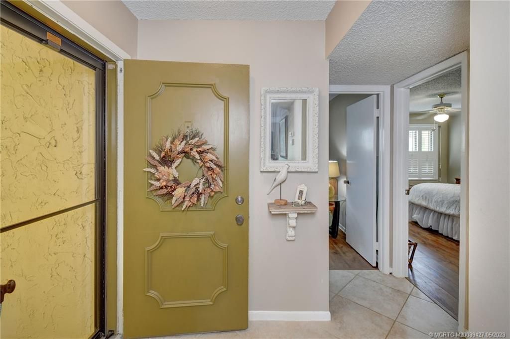 Photo of 5355 SE Miles Grant Road #E103, Stuart, FL 34997 (MLS # M20039427)