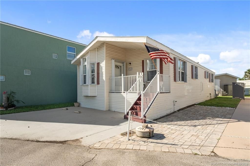 Photo of 2142 Nettles Boulevard, Jensen Beach, FL 34957 (MLS # M20050876)