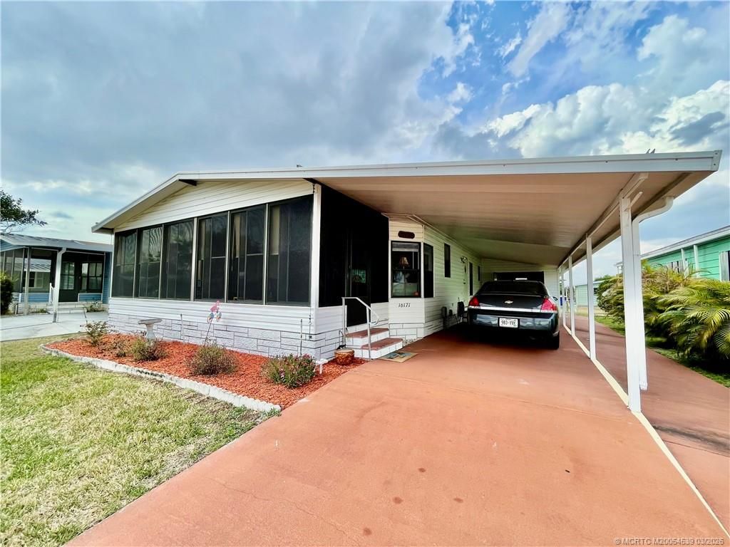 Photo of 16171 Five Wood Way SW, Indiantown, FL 34956 (MLS # M20054539)