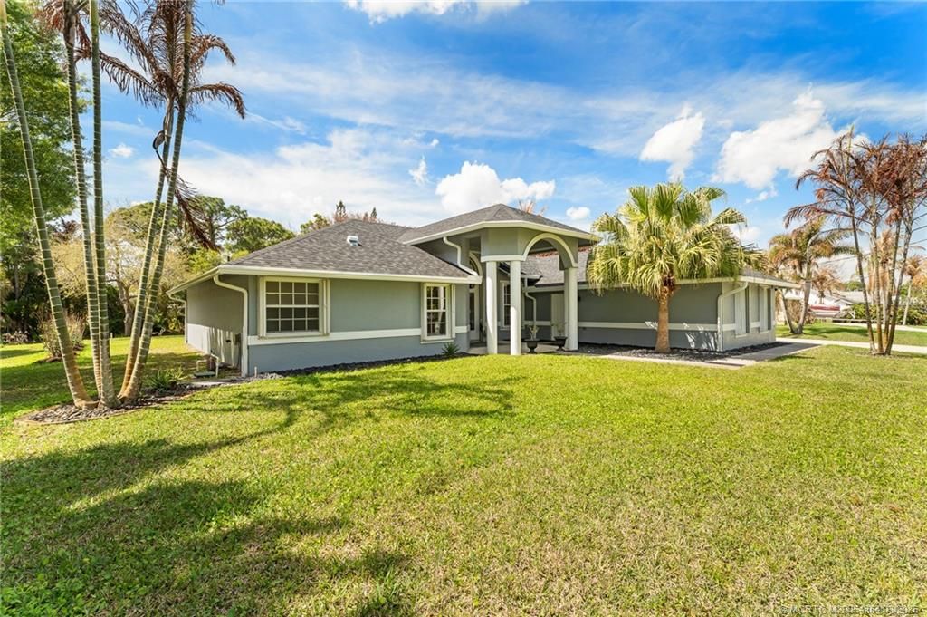 Photo of 2072 SE Hanford Road, Port Saint Lucie, FL 34952 (MLS # M20054864)