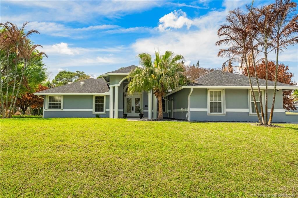 Photo of 2072 SE Hanford Road, Port Saint Lucie, FL 34952 (MLS # M20054864)