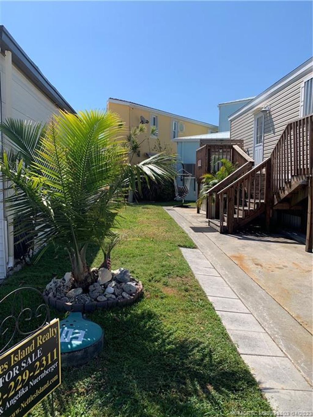 Photo of 1303 Nettles Boulevard, Jensen Beach, FL 34957 (MLS # M20038803)