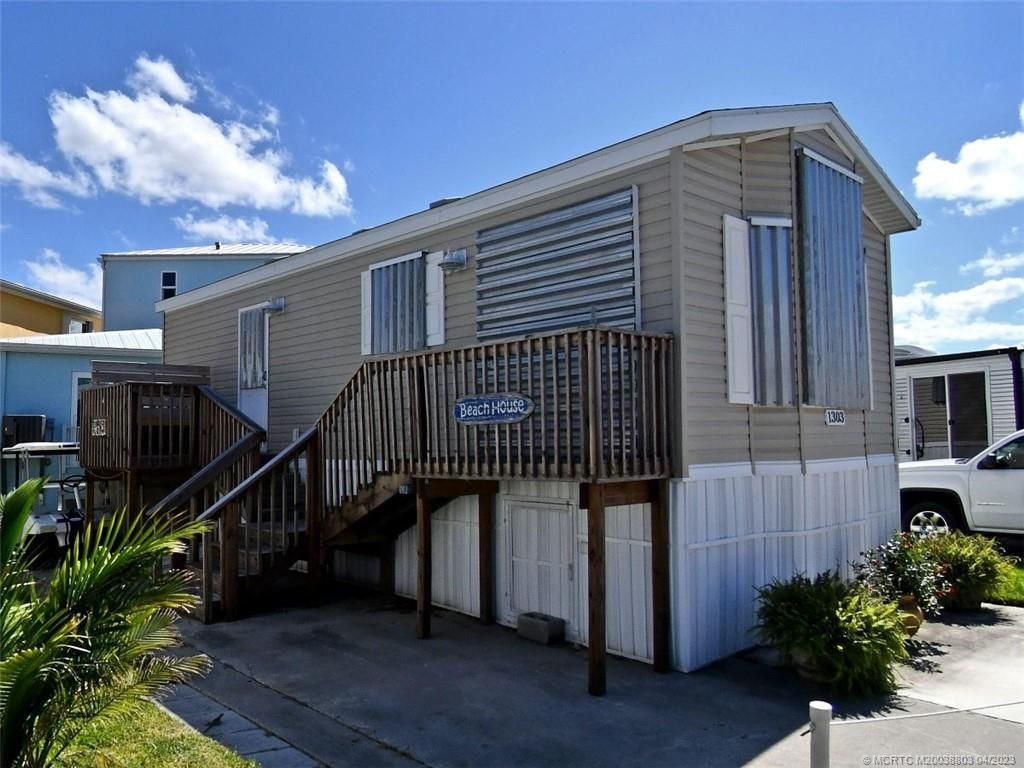 Photo of 1303 Nettles Boulevard, Jensen Beach, FL 34957 (MLS # M20038803)