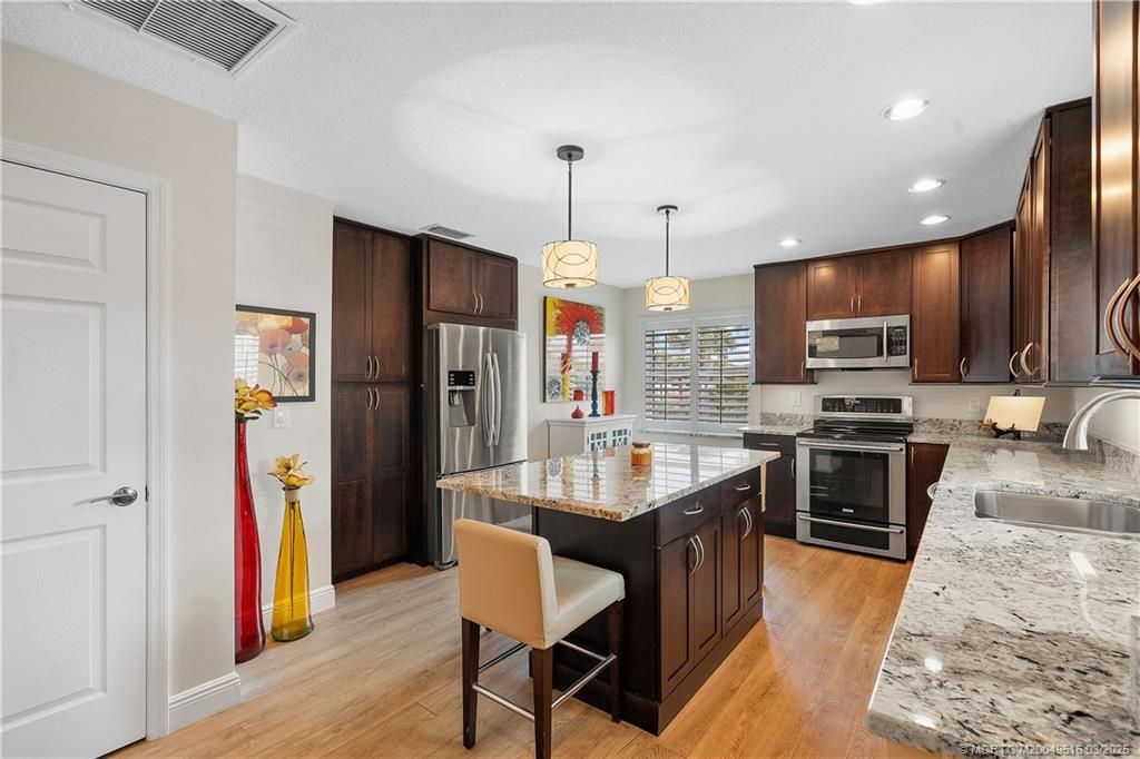 Photo of 6101 SE Landing Way #16, Stuart, FL 34997 (MLS # M20049516)