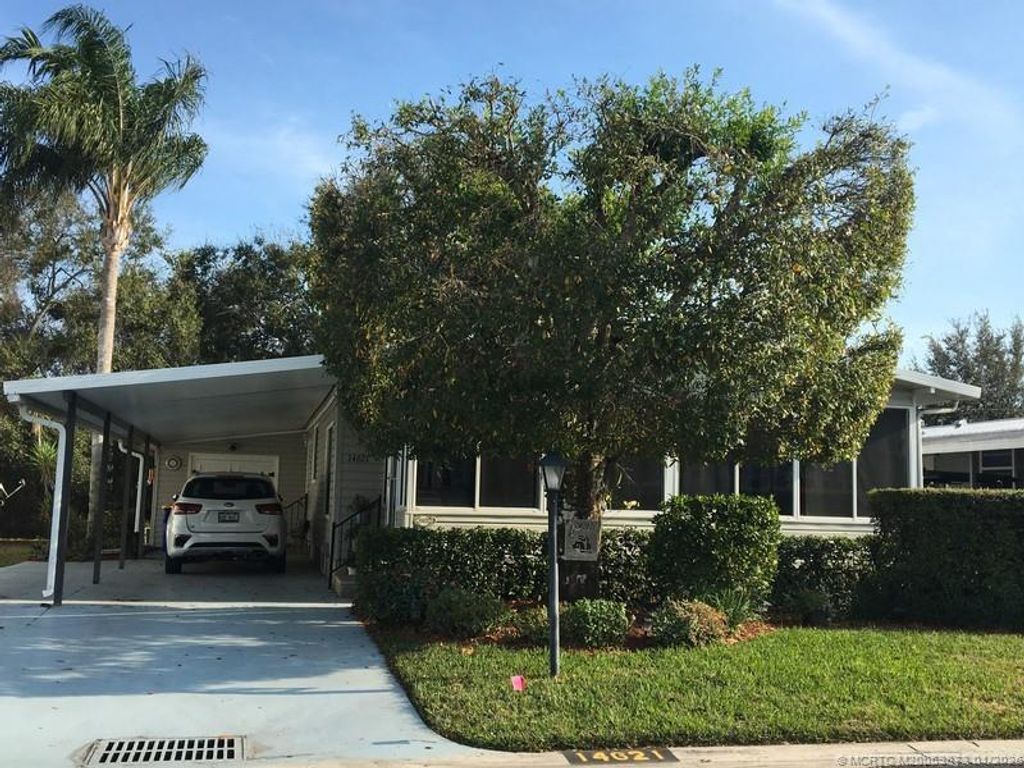 Photo of 14621 SW Divot Drive #A-17, Indiantown, FL 34956 (MLS # M20053873)