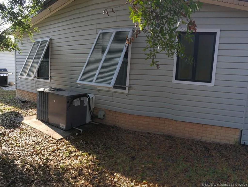 Photo of 14621 SW Divot Drive #A-17, Indiantown, FL 34956 (MLS # M20053873)