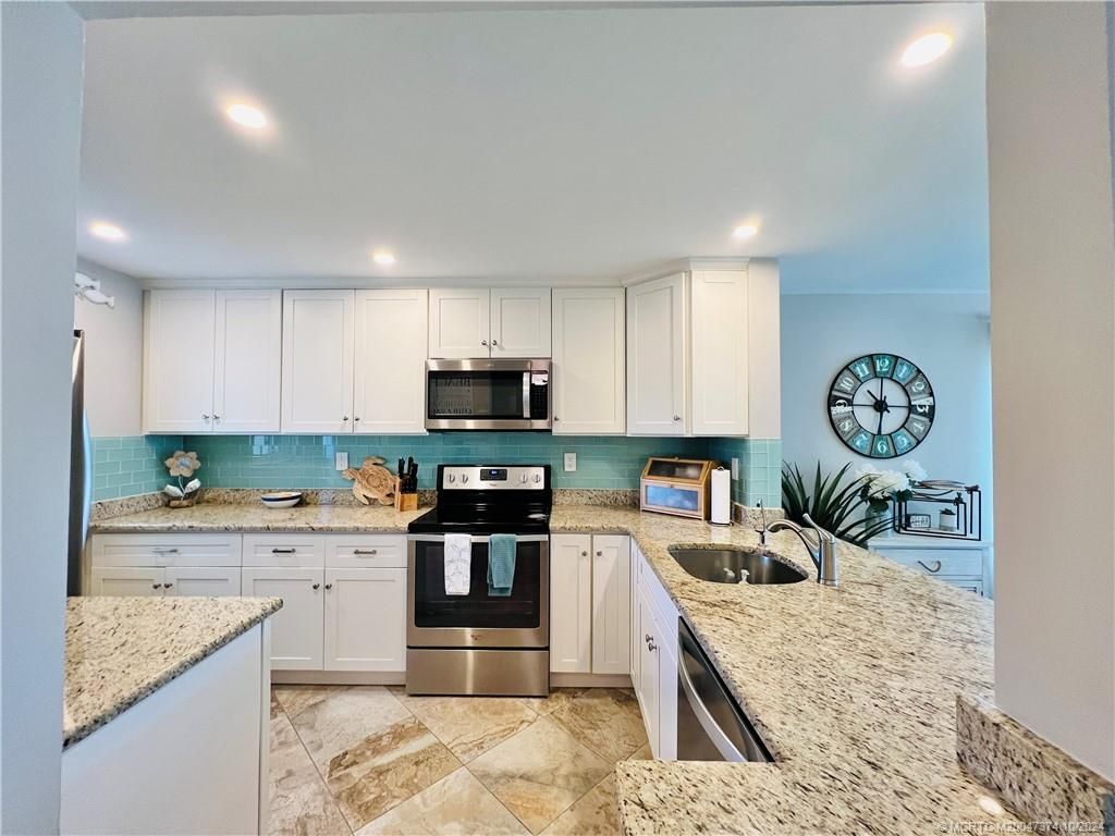 Photo of 10310 S Ocean Drive #201, Jensen Beach, FL 34957 (MLS # M20047374)