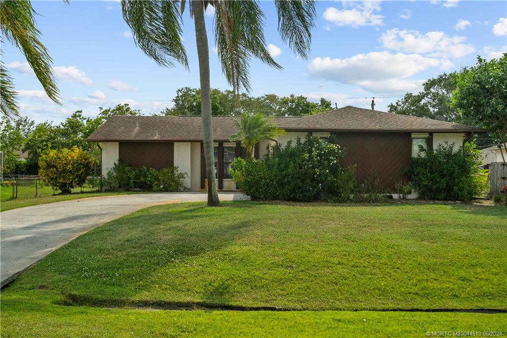 Photo of 1932 SW Sylvester Lane, Port Saint Lucie, FL 34984 (MLS # M20044513)